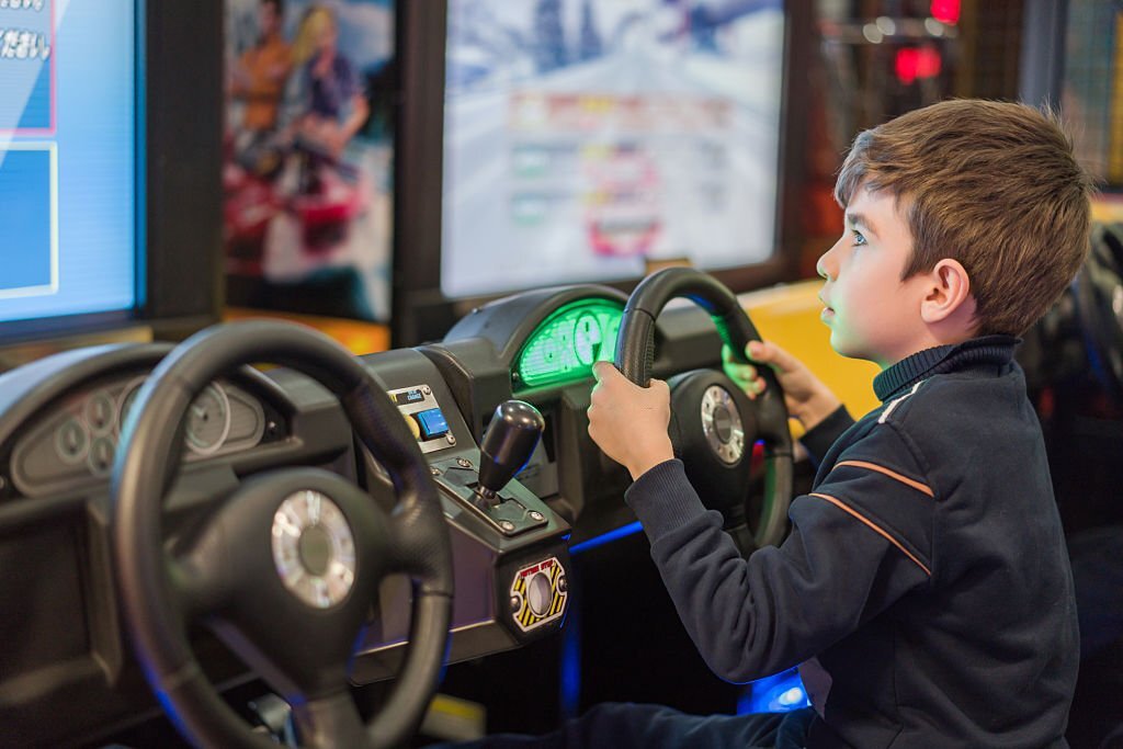 Kids playing arcade games
